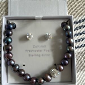 Brown fresh water pearl necklace with cubic zirconia accents.